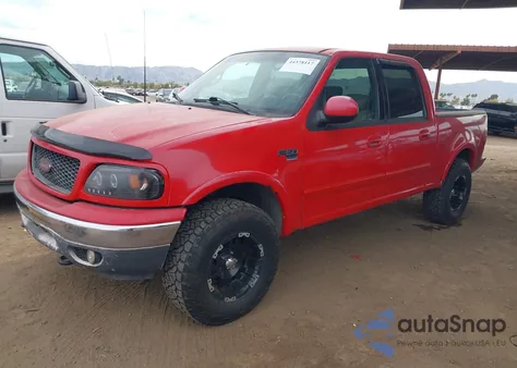 2001 Ford F-150 King Ranch Edition/Lariat/Xlt z USA, uszkodzony, nr VIN 1FTRW08L71KB19822